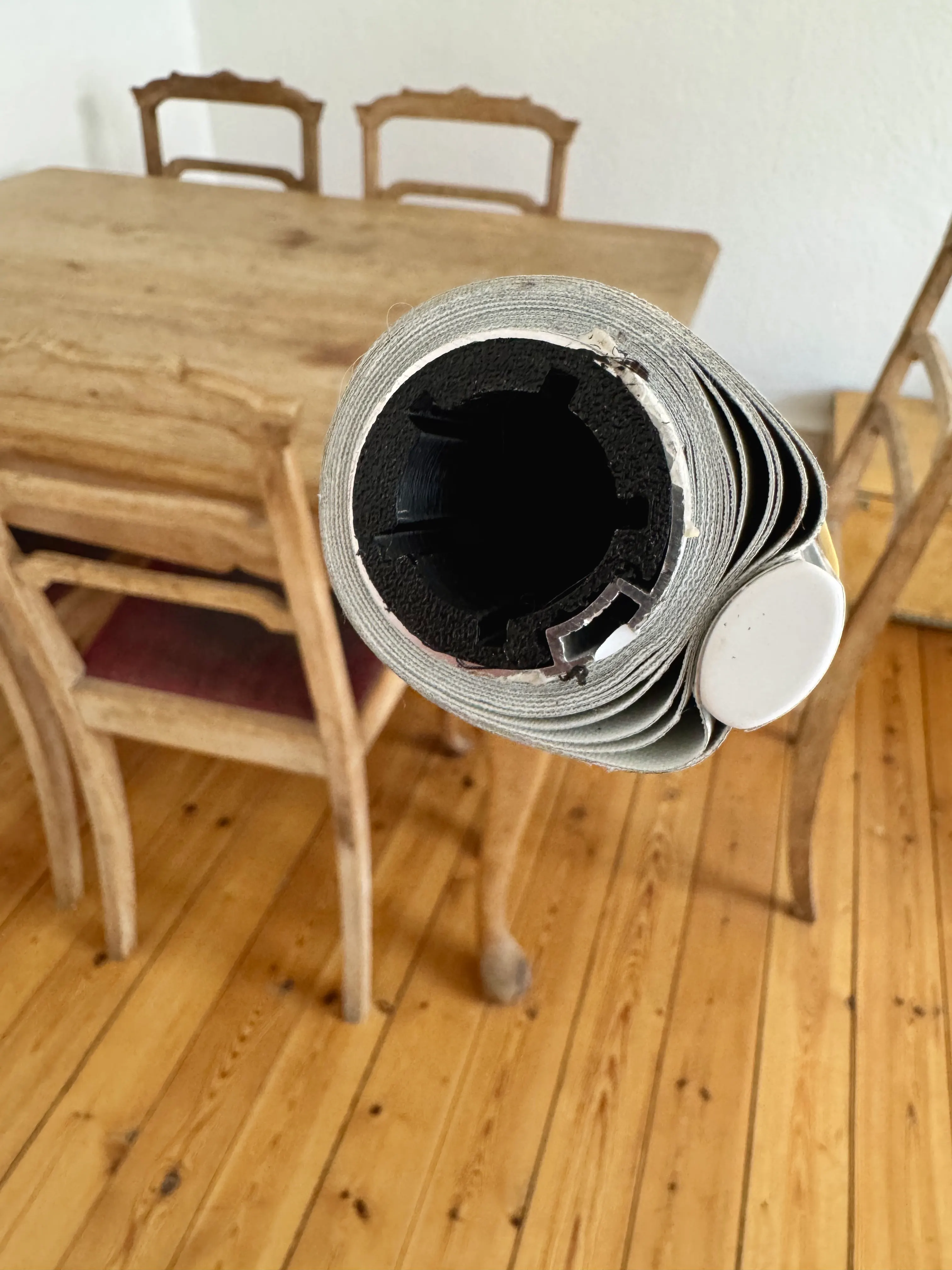Custom 3D-printed adapter fitted inside the original roller blind tube