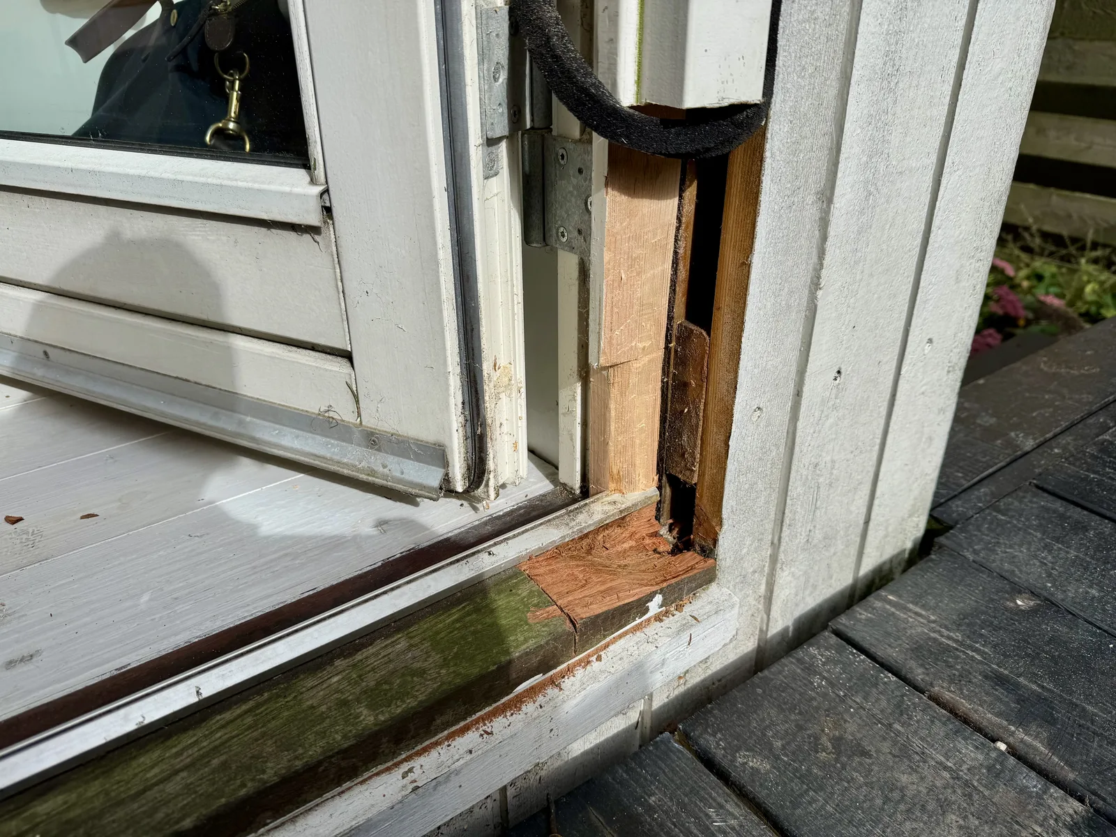 All rotten wood carefully removed to expose solid timber