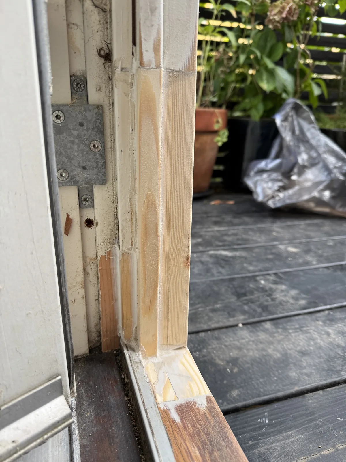 Door frame base restored and painted, detail of final finish