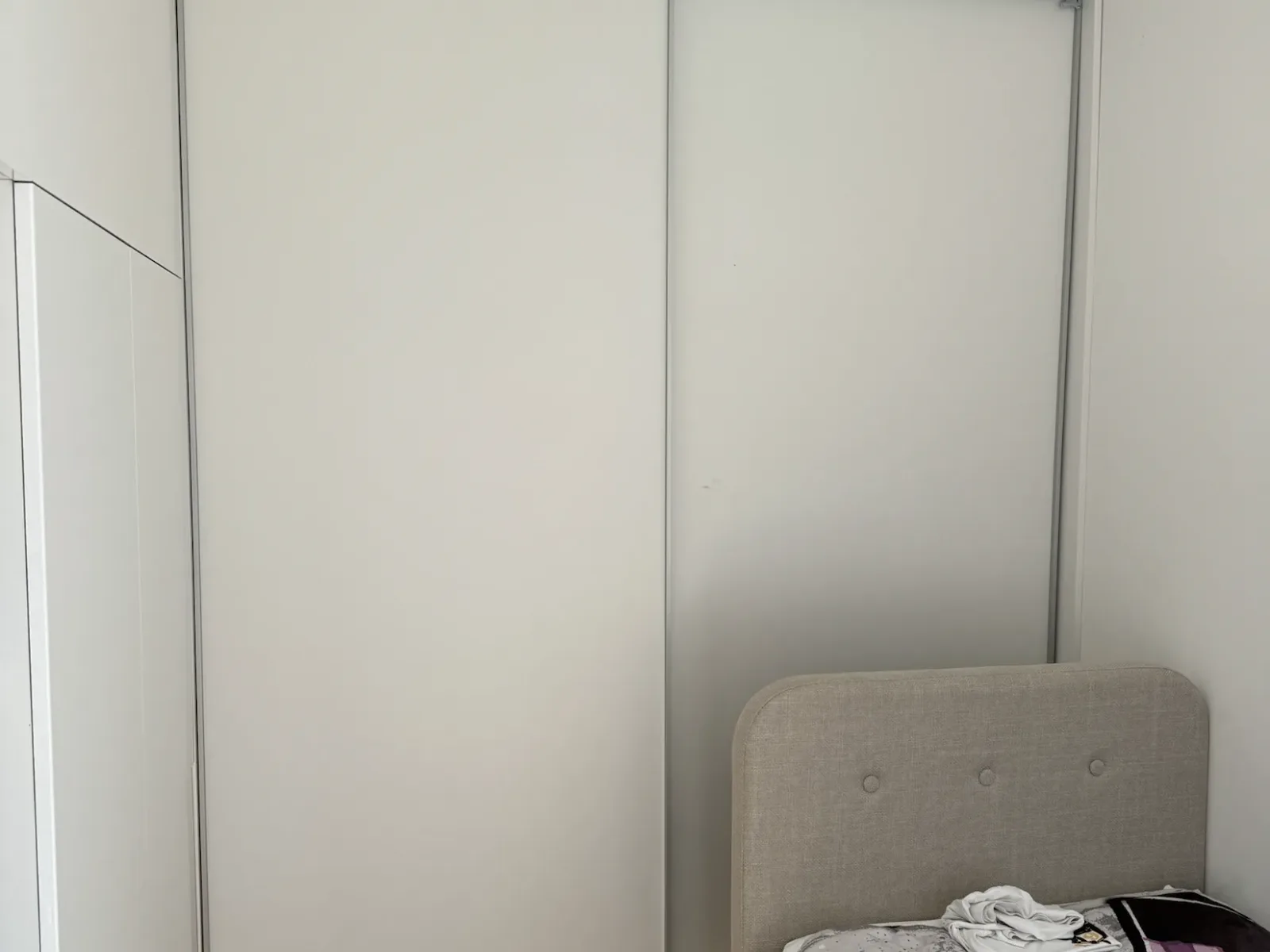 Finished sliding doors closed from the bedroom side